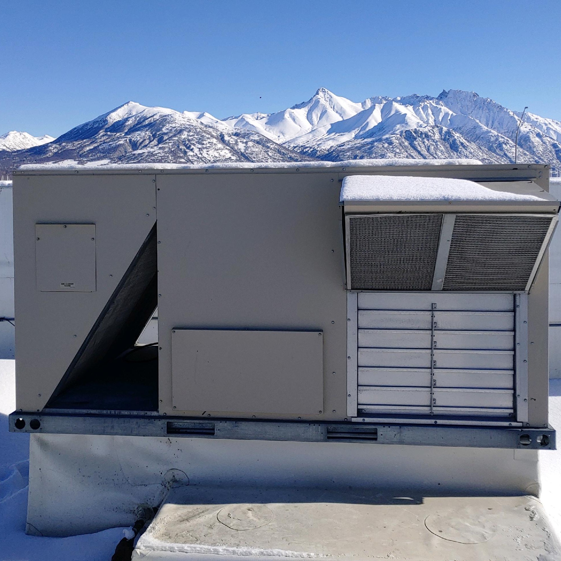 Hvac Unit with a mountain backdrop in Anchorage, AK.