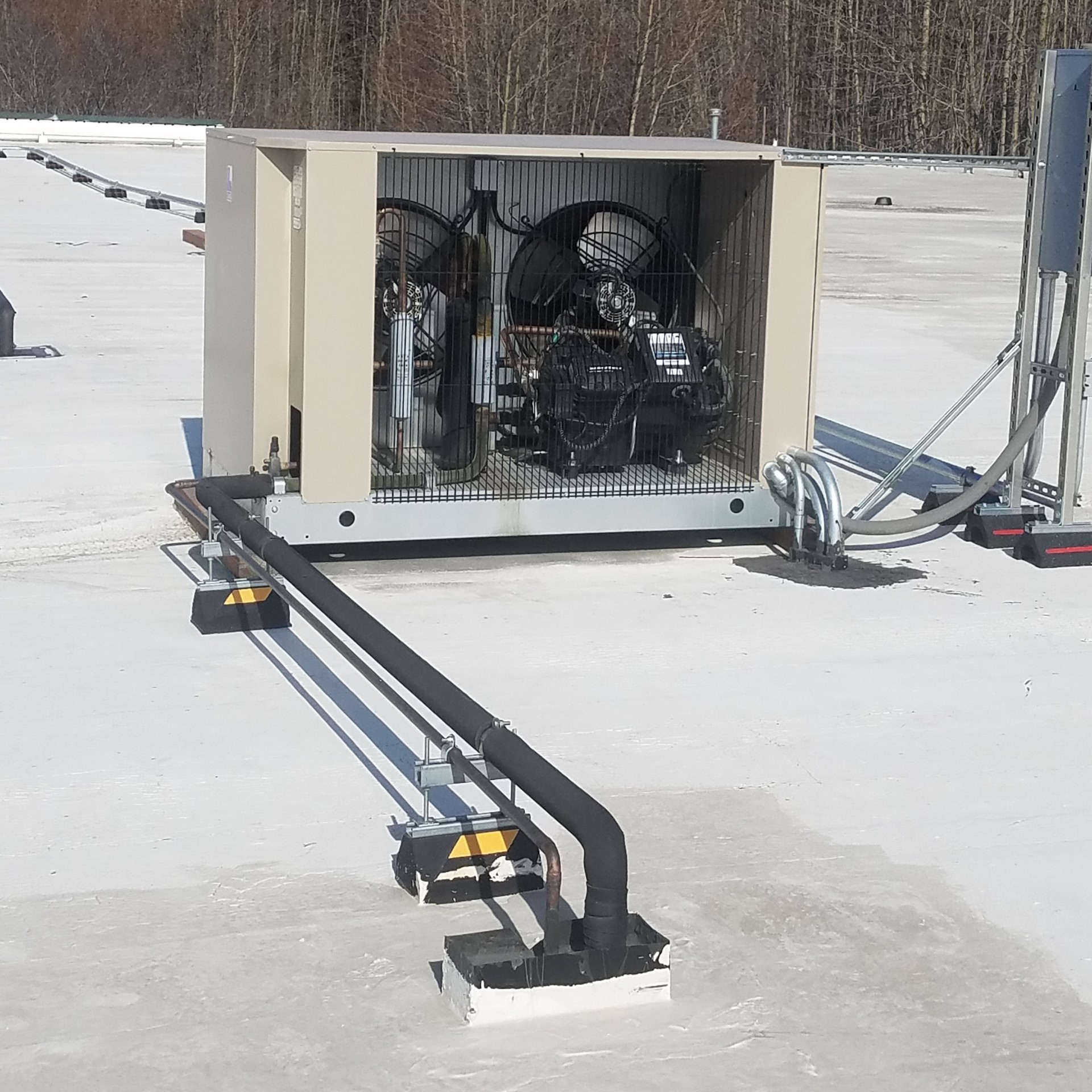 Commercial walk-in freezer condenser in Palmer, AK.